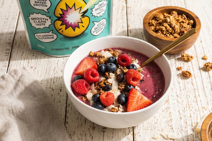 High-protein breakfast bowl with oats, yoghurt and berries with unflavoured protein mixed through