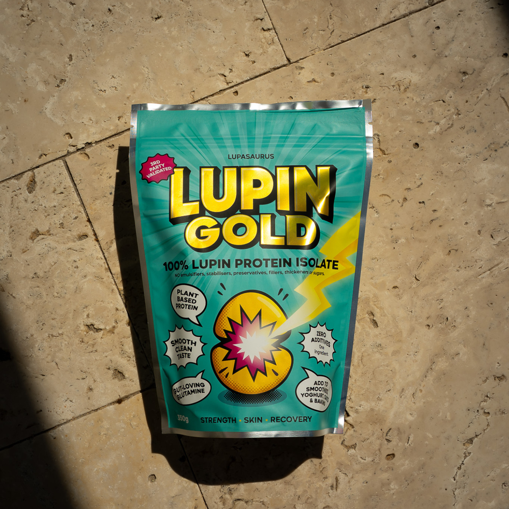 Lupin Gold 350g lupin protein isolate pack resting on warm limestone paving